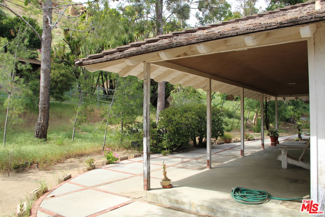 20490 Seaboard Road Malibu, CA 90265 - Photo 17 of 43 a patio with a yard