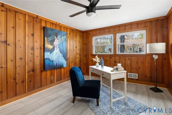 a view of a livingroom with furniture and window