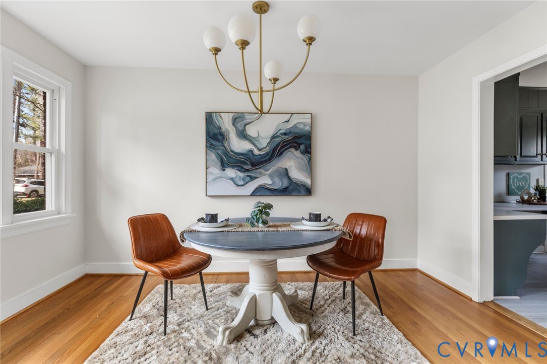 3407 Cooper Road Richmond, VA 23225 - Photo 8 of 33 a view of a workspace with furniture and wooden floor