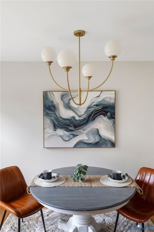 3407 Cooper Road Richmond, VA 23225 - Photo 9 of 33 a view of a dining room with furniture and wooden floor