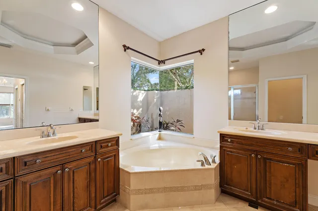 a view of a backyard with sitting area