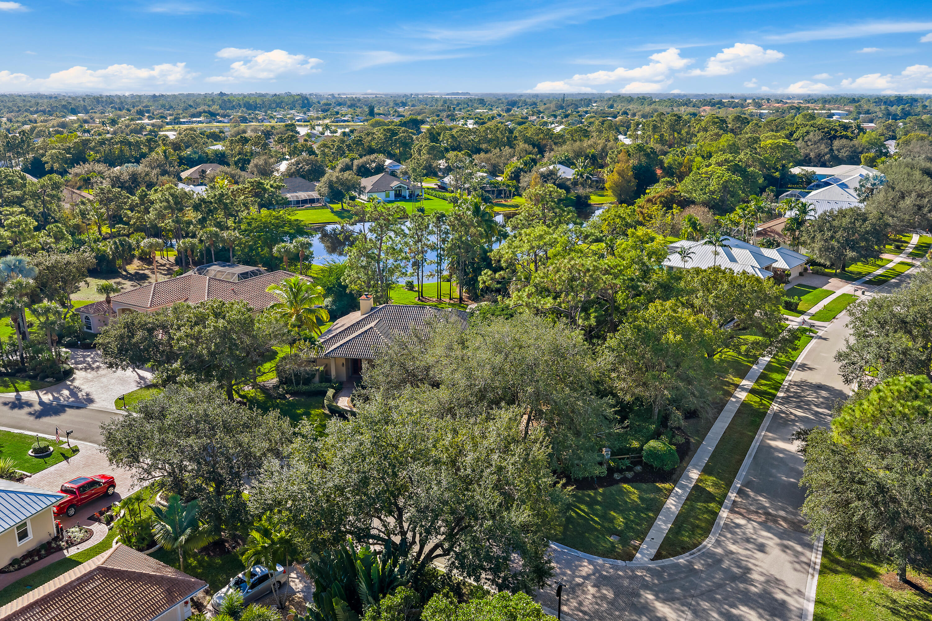 2650 Southwest Windship Way Stuart, FL 34997 - Photo 63 of 82 an aerial view of residential houses with outdoor space and trees