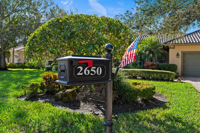 a view of a house with a garden