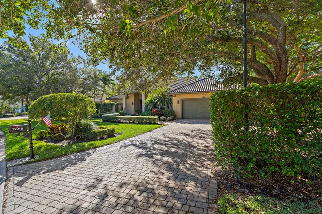 a very nice looking room with a big bed and a fireplace