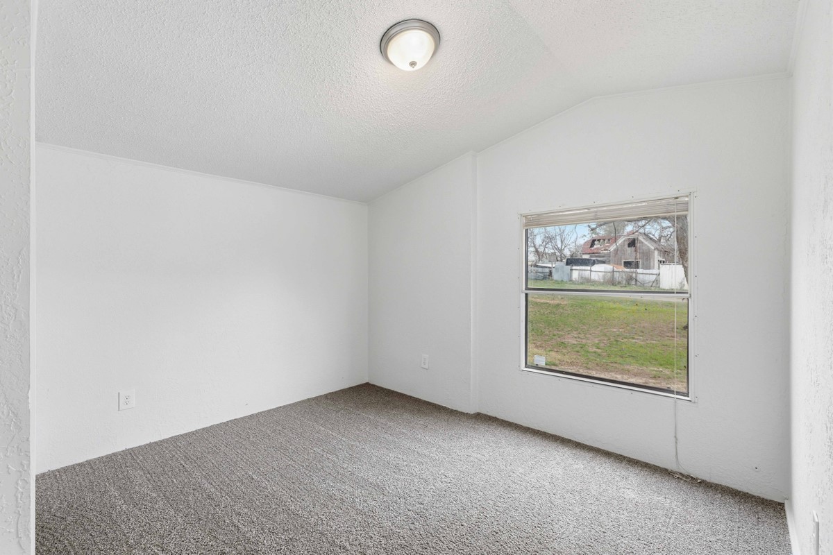 608 4th Street Blanket, TX 76432 - Photo 11 of 24 an empty room with windows