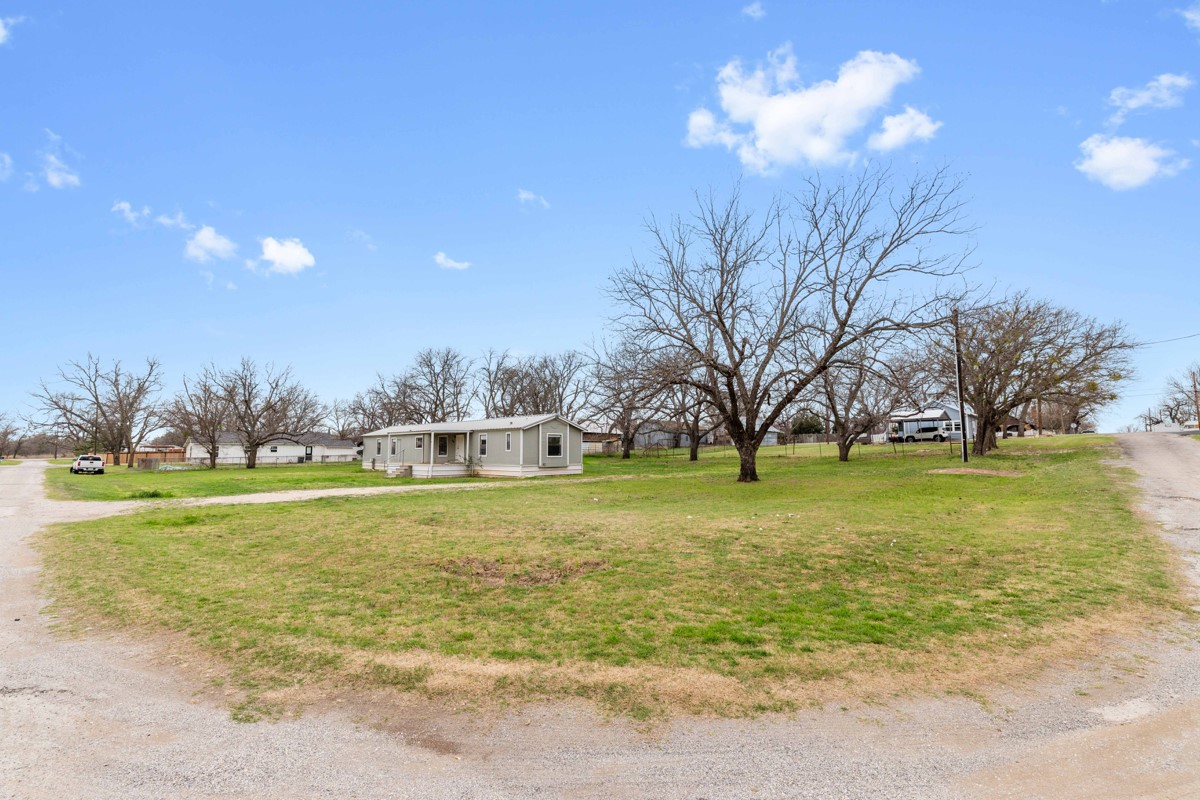 608 4th Street Blanket, TX 76432 - Photo 15 of 24 a view of an outdoor space and a yard