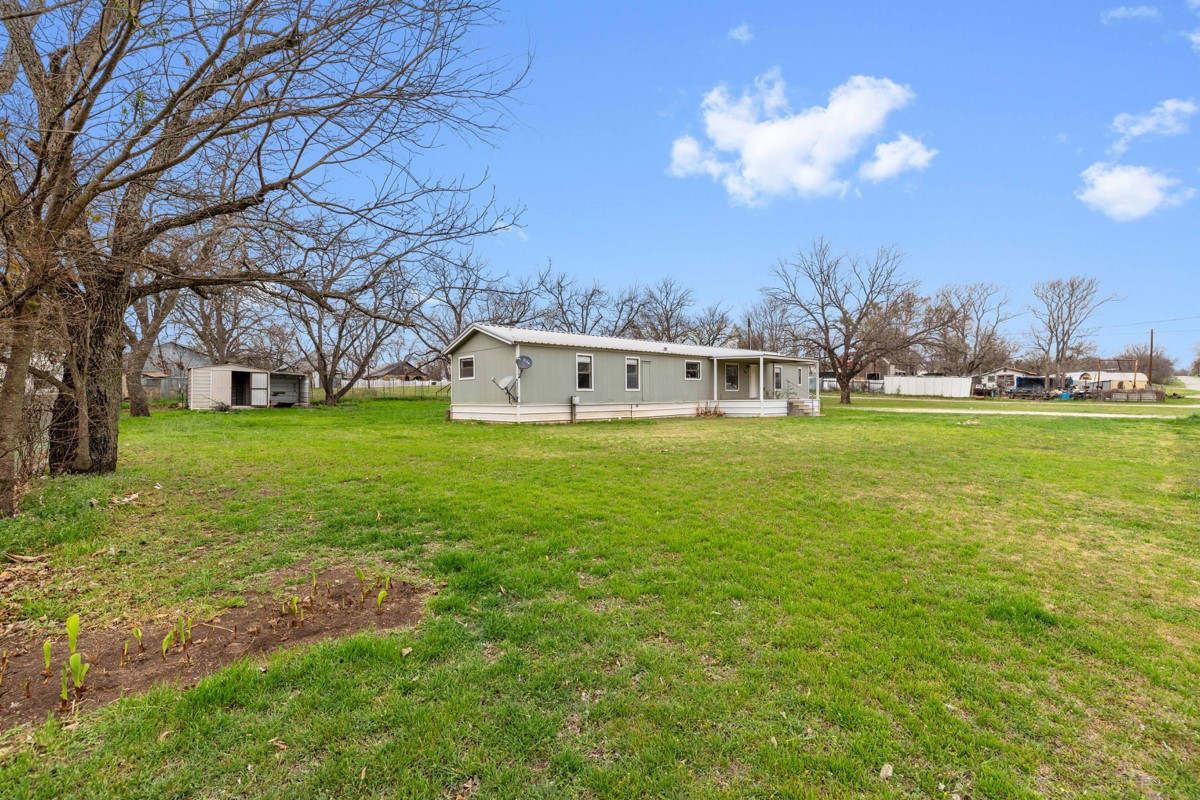 608 4th Street Blanket, TX 76432 - Photo 19 of 24 a view of a lake with houses