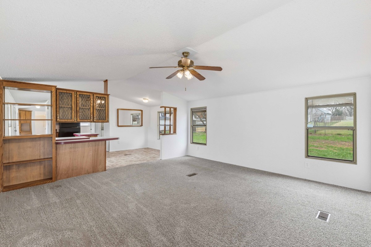 608 4th Street Blanket, TX 76432 - Photo 2 of 24 a view of a kitchen with furniture and a kitchen area