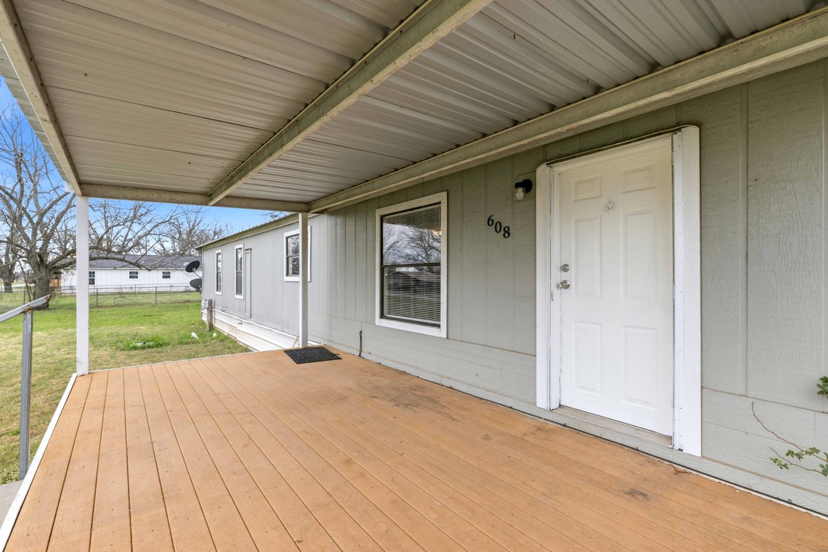 608 4th Street Blanket, TX 76432 - Photo 21 of 24 a view of a house with backyard and porch
