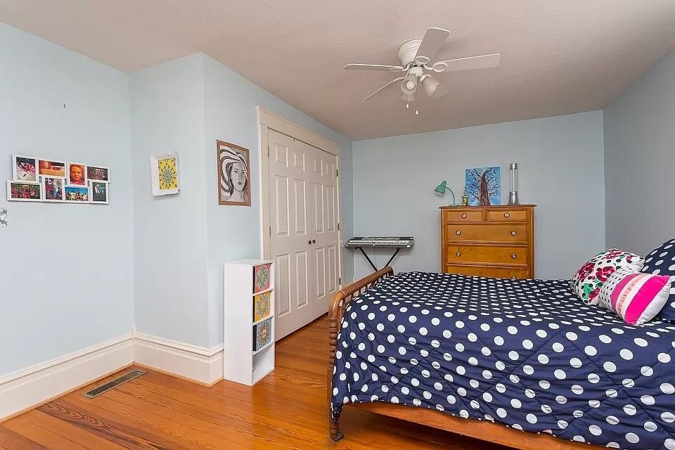 163 Pleasant View Road Staunton, VA 24401 - Photo 21 of 50 a bedroom with a bed and wooden floor