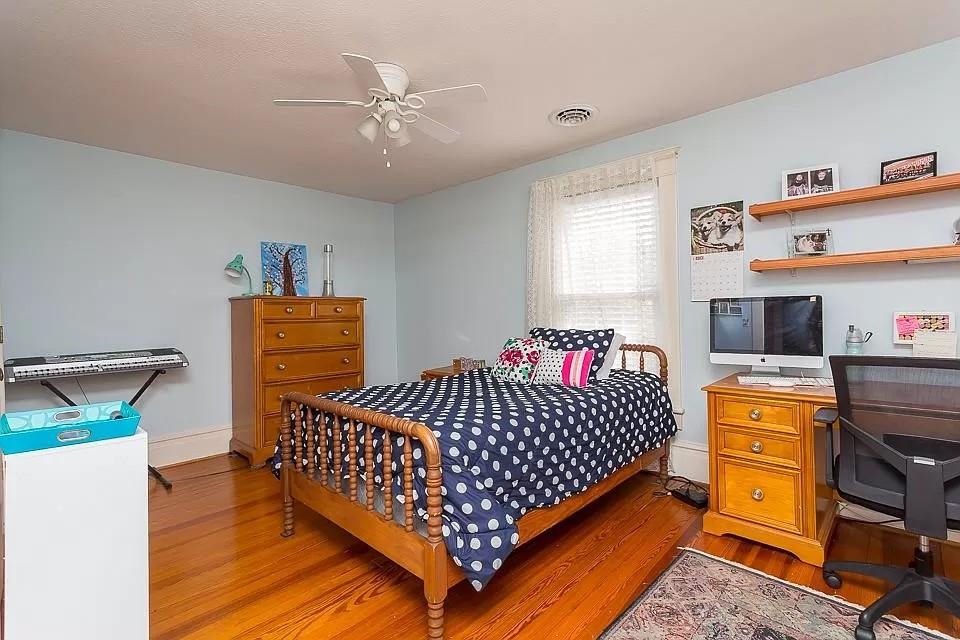 163 Pleasant View Road Staunton, VA 24401 - Photo 22 of 50 a bedroom with a bed and wooden floor