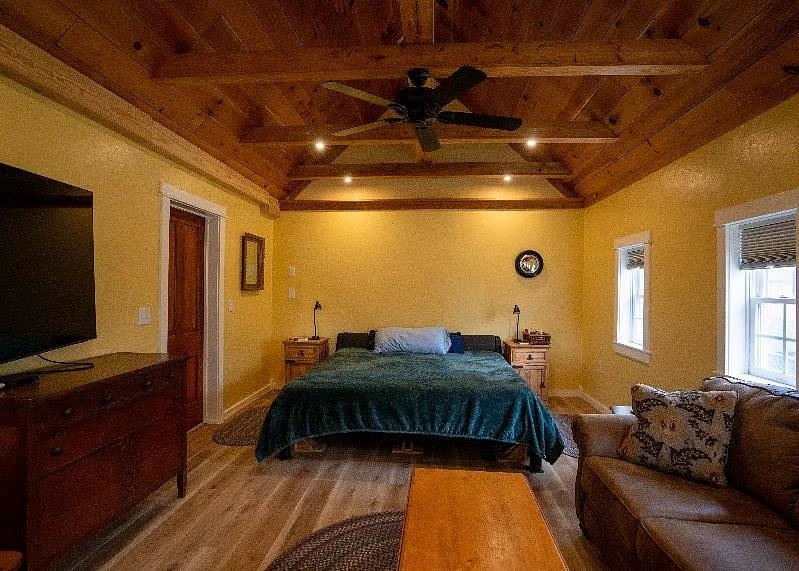 163 Pleasant View Road Staunton, VA 24401 - Photo 35 of 50 a bedroom with a bed and wooden floor