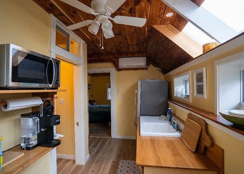 163 Pleasant View Road Staunton, VA 24401 - Photo 37 of 50 a view of a living room with a flat tv screen tv and windows