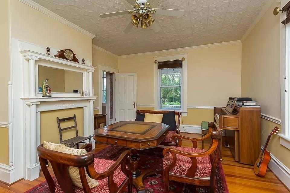 163 Pleasant View Road Staunton, VA 24401 - Photo 7 of 50 a view of a dining room with furniture and a fireplace