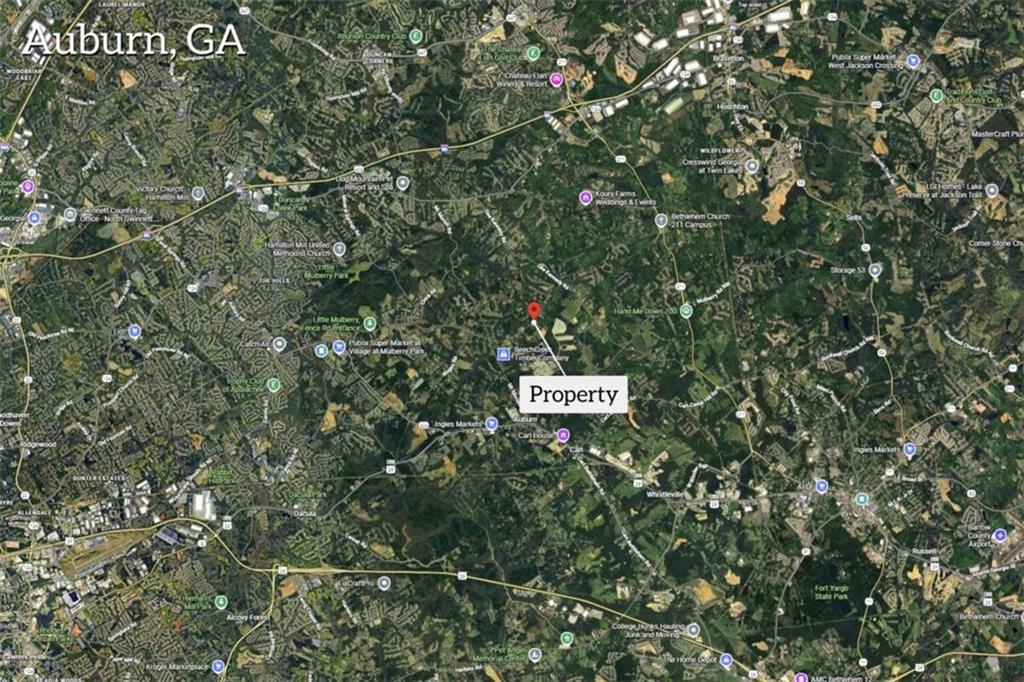 1329 Harmony Grove Church Road Auburn, GA 30011 - Photo 20 of 20 a sign that is sitting in front of a tree