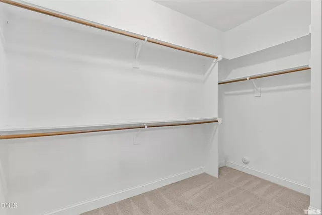 a view of a terrace with wooden floor and a ceiling fan