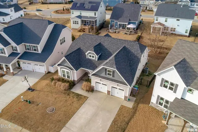 a living room with stainless steel appliances kitchen island granite countertop furniture and a kitchen view