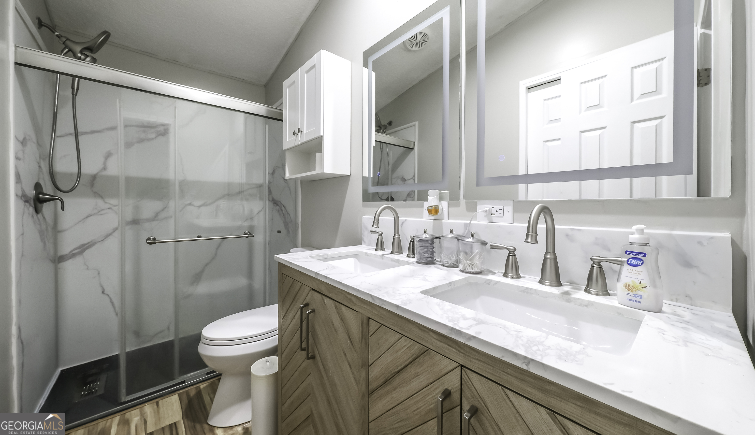 91 Holder Road Temple, GA 30179 - Photo 28 of 40 a bathroom with a sink a toilet and a shower