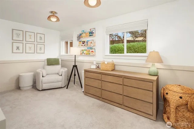 a bedroom with a bed and a couch