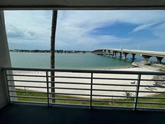 a view of a balcony with lake view