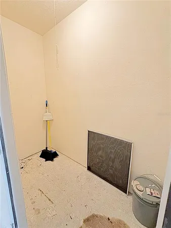 a bedroom with a bed and toilet