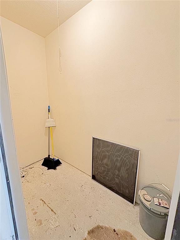 10764 70th Avenue, Unit 8201 Seminole, FL 33772 - Photo 21 of 37 a bedroom with a bed and toilet