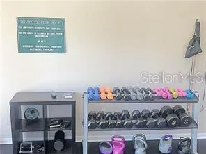 a view of a table and a book shelf