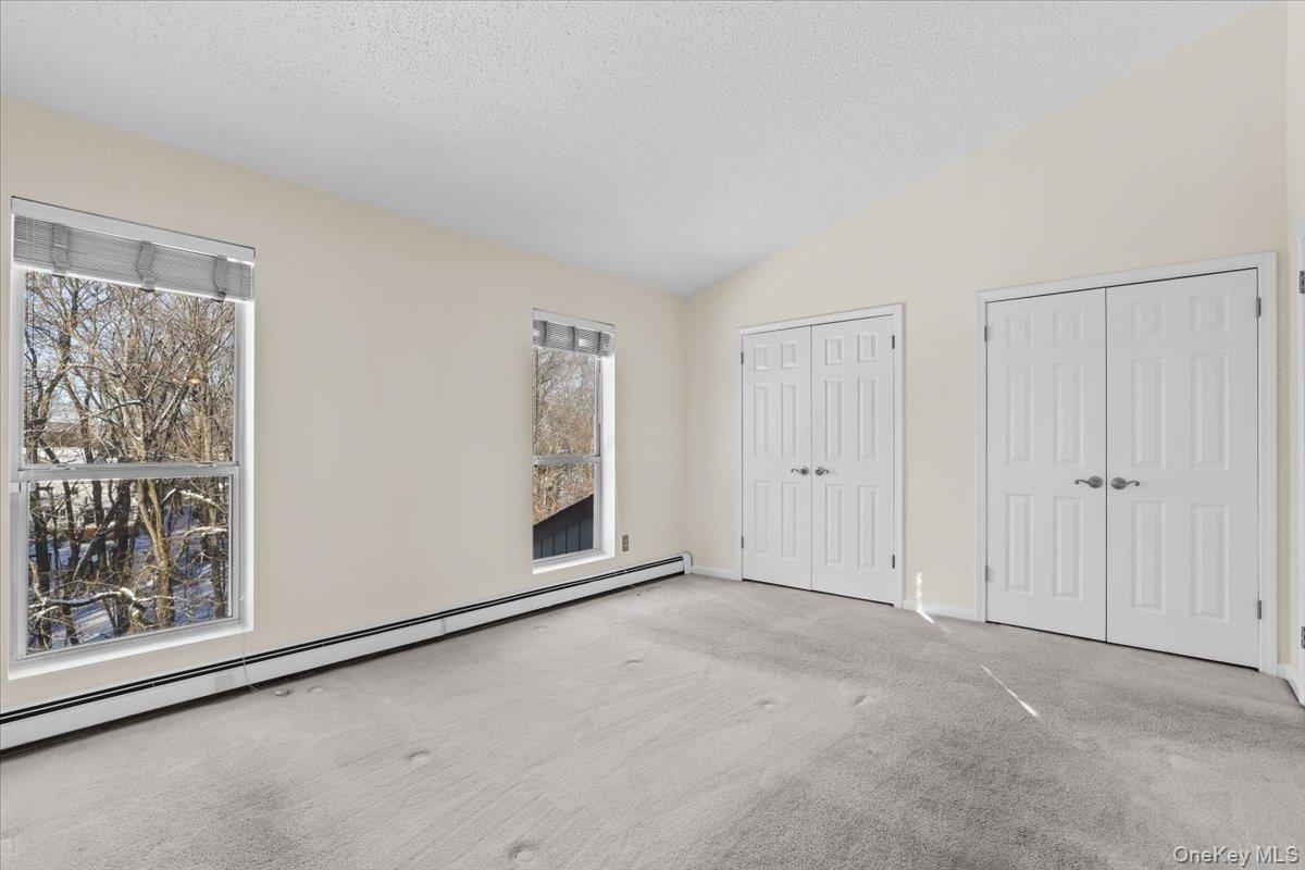 51 Hemlock Circle Peekskill, NY 10566 - Photo 11 of 21 a view of an empty room with a window