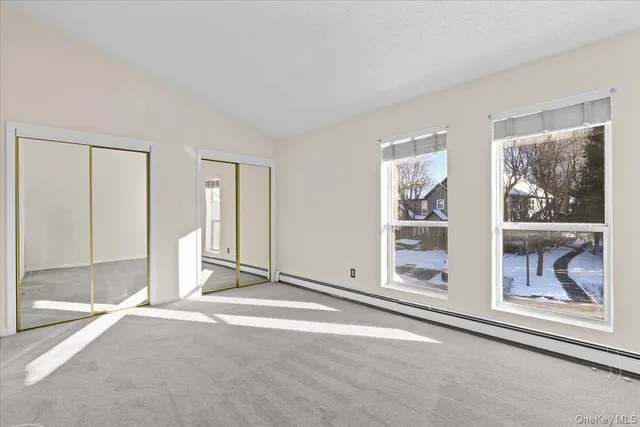 a view of a room with large window