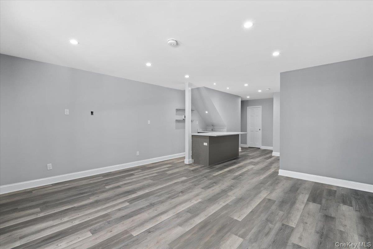 51 Hemlock Circle Peekskill, NY 10566 - Photo 16 of 21 a view of kitchen with kitchen island microwave and stove