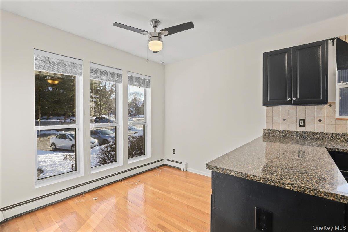 51 Hemlock Circle Peekskill, NY 10566 - Photo 4 of 21 a view of a kitchen with granite countertop a sink and a stove top oven