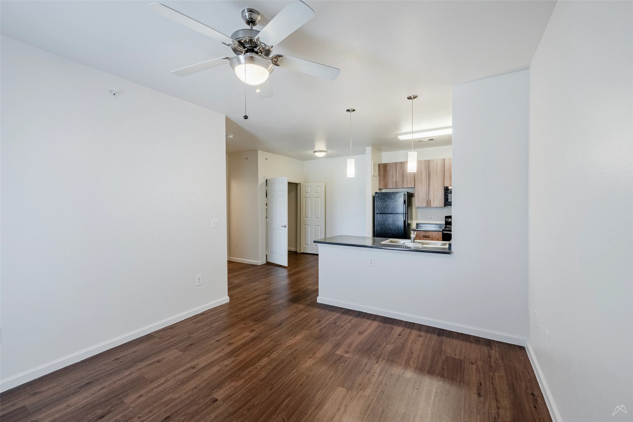 5605 Springdale Road, Unit 333413 Austin, TX 78723 - Photo 13 of 27 a view of kitchen with wooden floor
