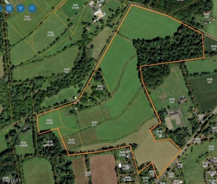 an aerial view of a residential houses with outdoor space