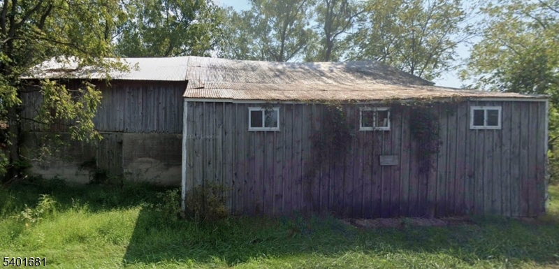 32 Reading Road Stockton, NJ 08559 - Photo 2 of 2 a view of backyard with jacuzzi