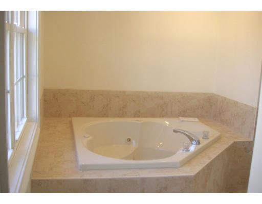 27 Hartwell Place Canton, MA 02021 - Photo 8 of 12 a bathroom with a tub