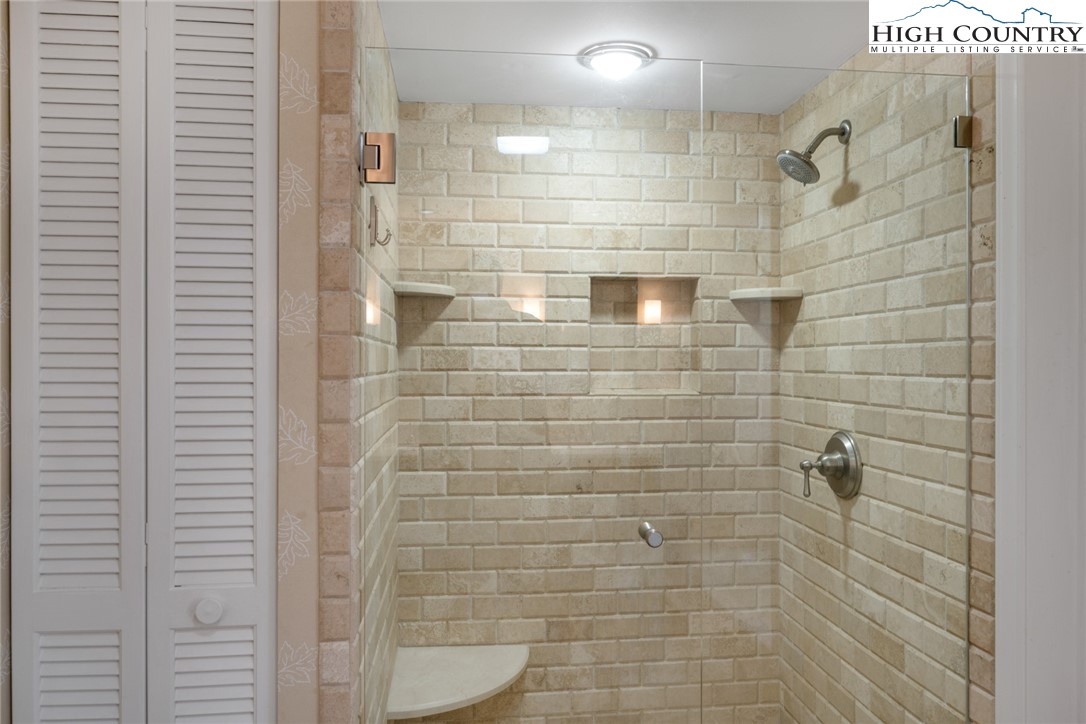 404 Moon Run, Unit D Linville, NC 28646 - Photo 17 of 27 a bathroom with a shower