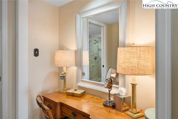 a dining room with table and chairs