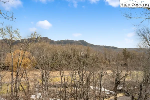 a view of mountain view with mountains in the background