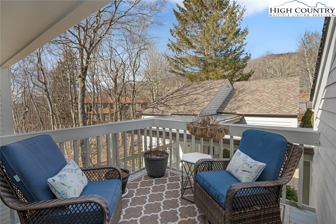 404 Moon Run, Unit D Linville, NC 28646 - Photo 24 of 27 a balcony with furniture