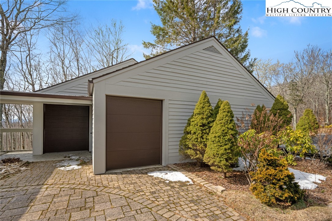 404 Moon Run, Unit D Linville, NC 28646 - Photo 26 of 27 a view of a house with a pathway of a house