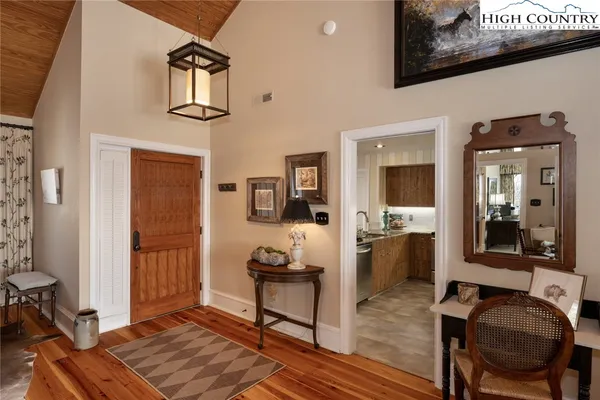 a view of a livingroom with furniture and windows