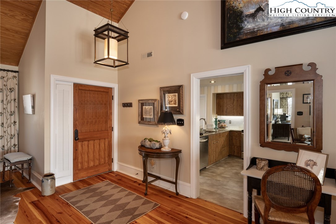 404 Moon Run, Unit D Linville, NC 28646 - Photo 3 of 27 a view of a livingroom with furniture and windows