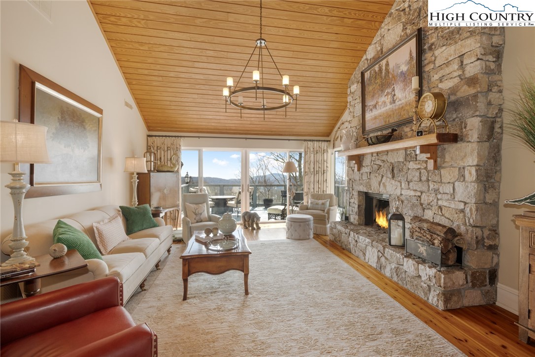 404 Moon Run, Unit D Linville, NC 28646 - Photo 5 of 27 a living room with furniture and a fireplace