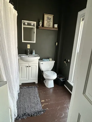 a view of balcony with furniture