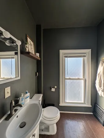 a view of empty room with wooden ceiling