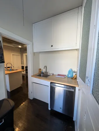 a room with a bed and a window