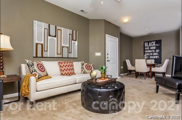 1555 Paddock Club Lane Fort Mill, SC 29715 - Photo 6 of 17 a living room with furniture