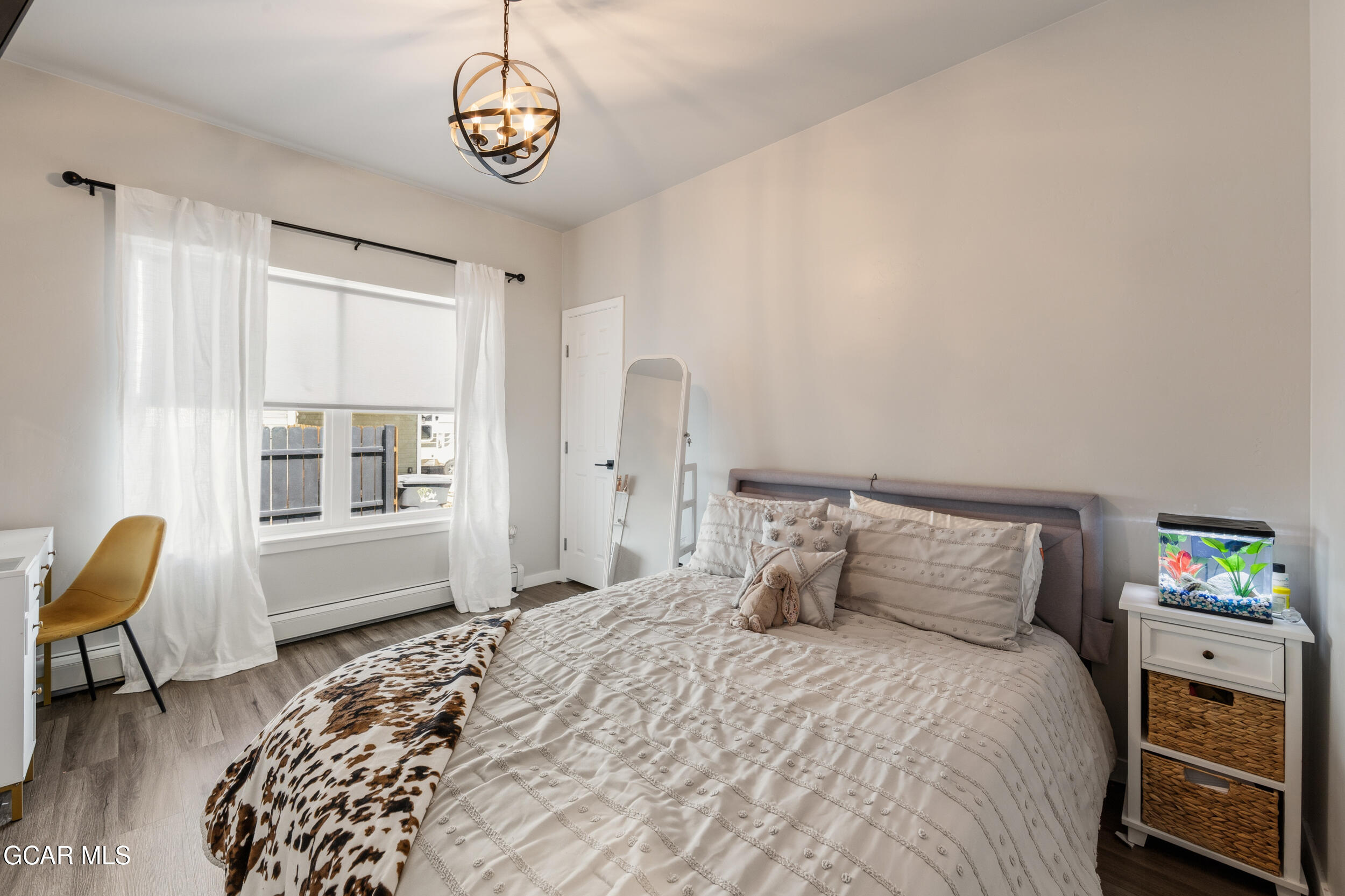 503 12th Street, Unit B Kremmling, CO 80459 - Photo 20 of 44 a bedroom with a bed and a window