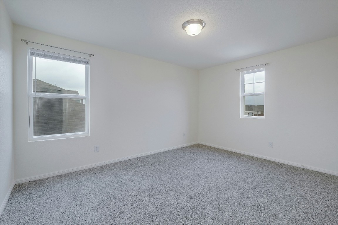 140 Satsuma Lane Kyle, TX 78640 - Photo 23 of 30 an empty room with a window