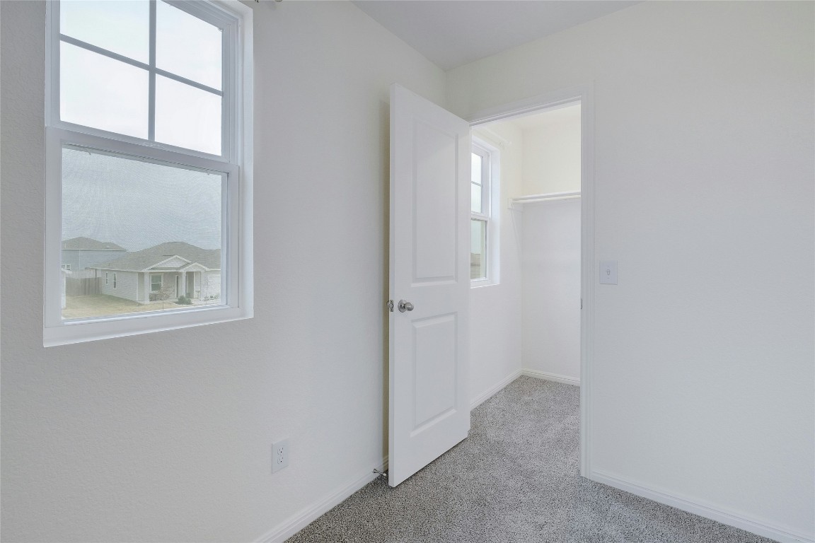 140 Satsuma Lane Kyle, TX 78640 - Photo 24 of 30 a view of an empty room with a window